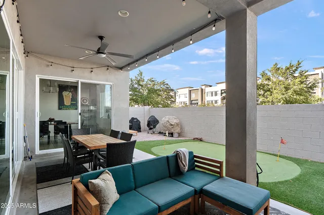 a view of a house with sitting area and furniture