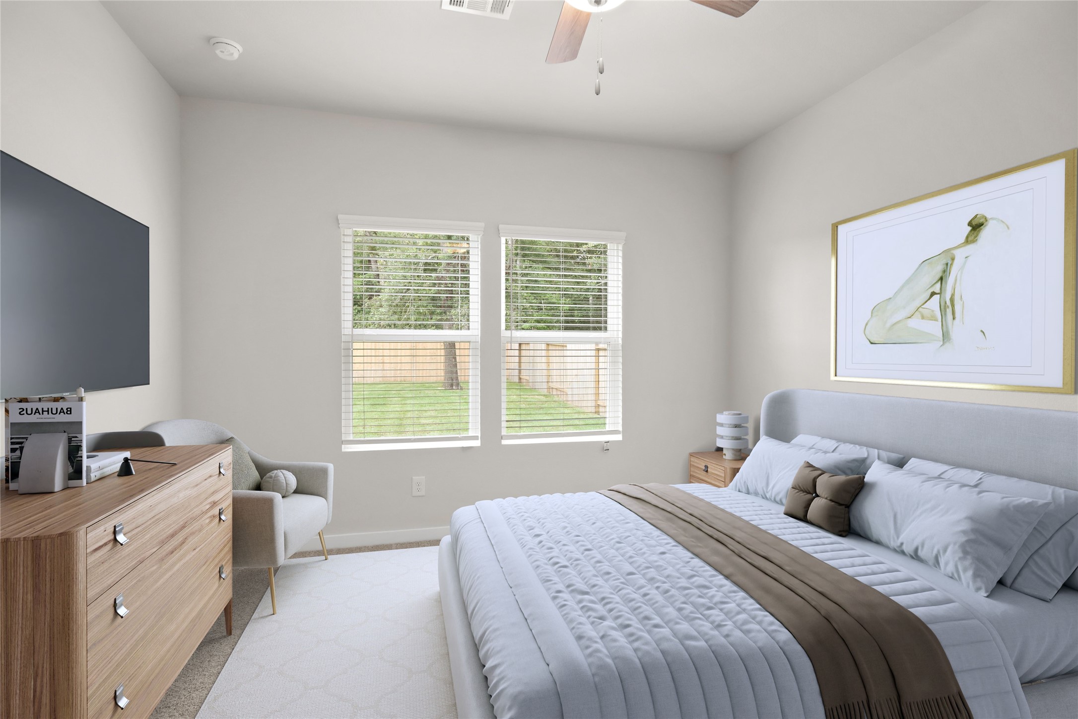 4414 Albritton Avenue Bryan, TX 77845 - Photo 18 of 34 a bedroom with a large bed and a flat tv screen on a dresser