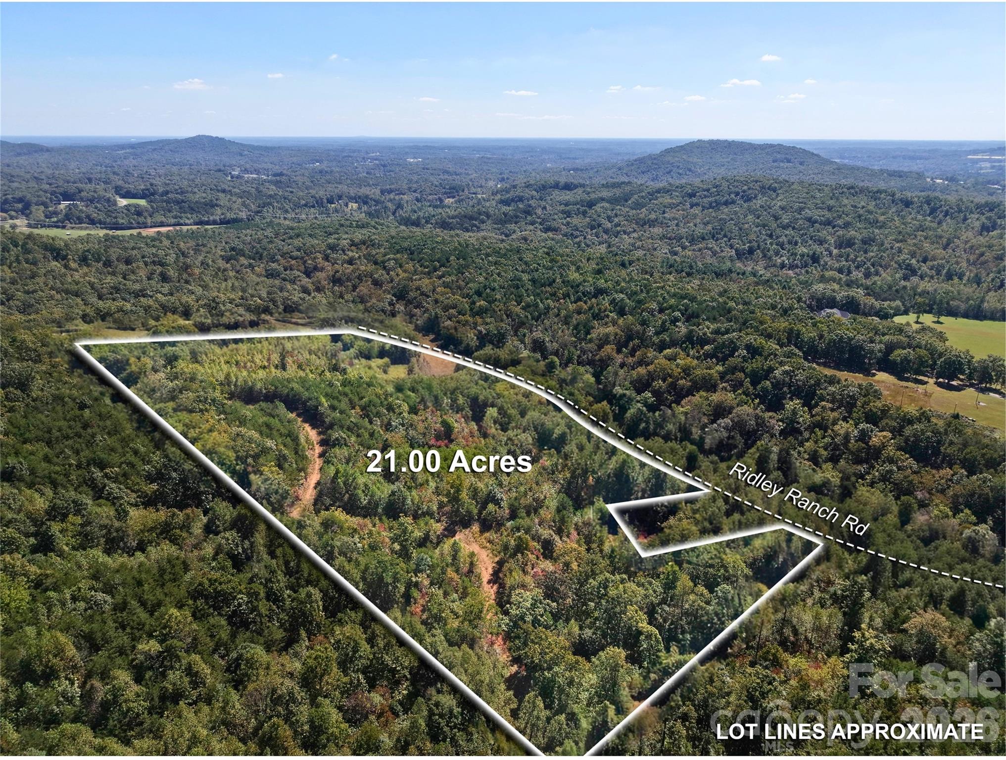 00 Ridley Ranch Road, Unit LOT 2 Hiddenite, NC 28636 - Photo 4 of 23 a view of a balcony with a floor to ceiling window