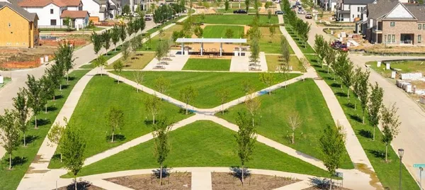 a view of a patio with a table chairs and a table