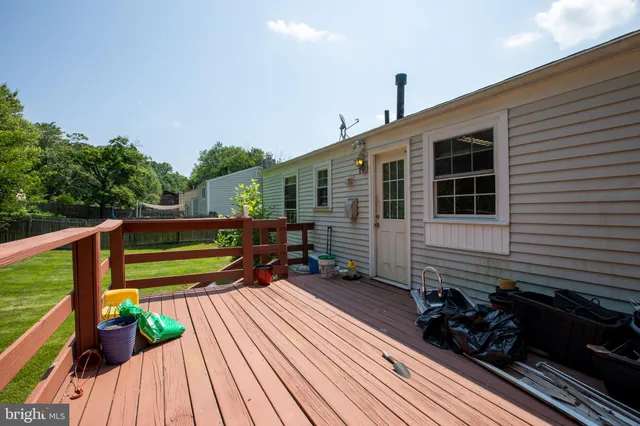 a view of a two chairs in the balcony