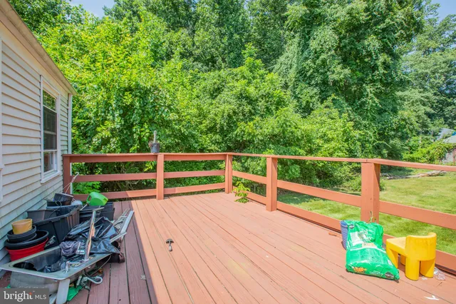 a view of balcony with wooden floor