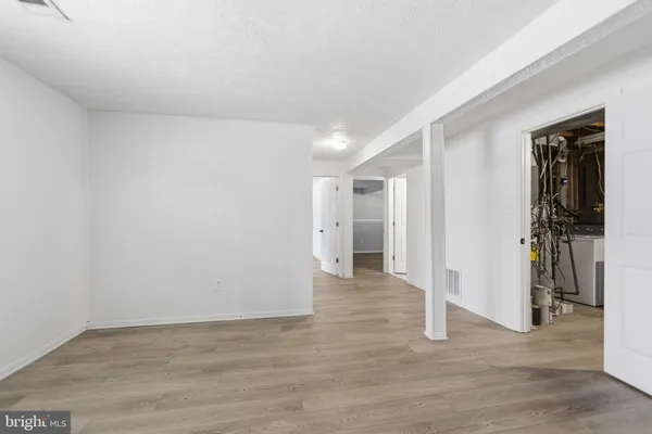 a view of entryway with wooden floor