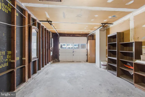 a view of an empty room with stairs