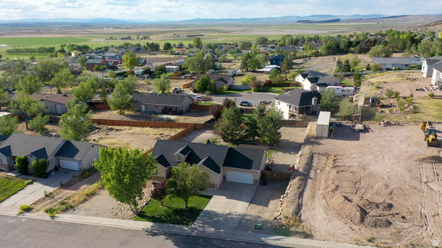 1797 Sunset Road Enoch, UT 84721 - Photo 66 of 80 Residential neighborhood with diverse home styles, mature landscaping, and clear skies