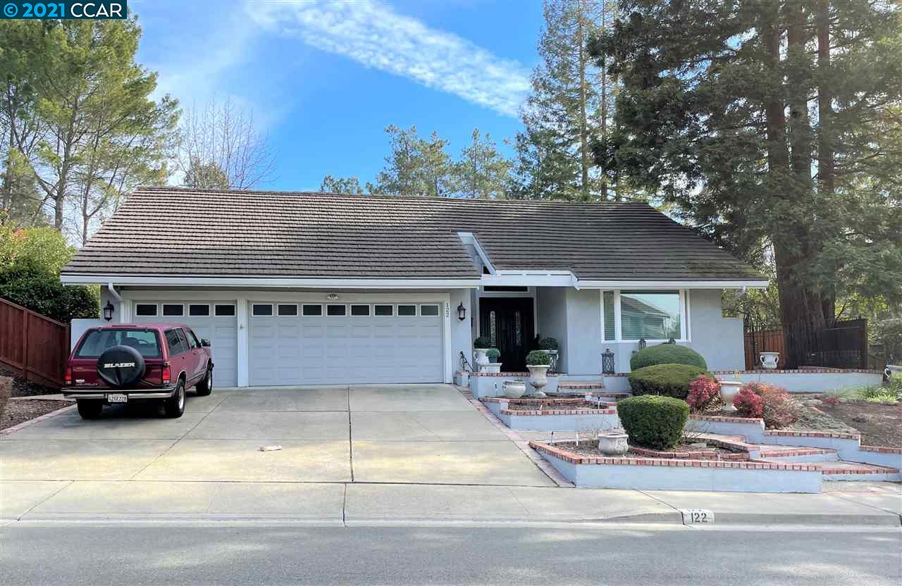 a car parked in front of a house