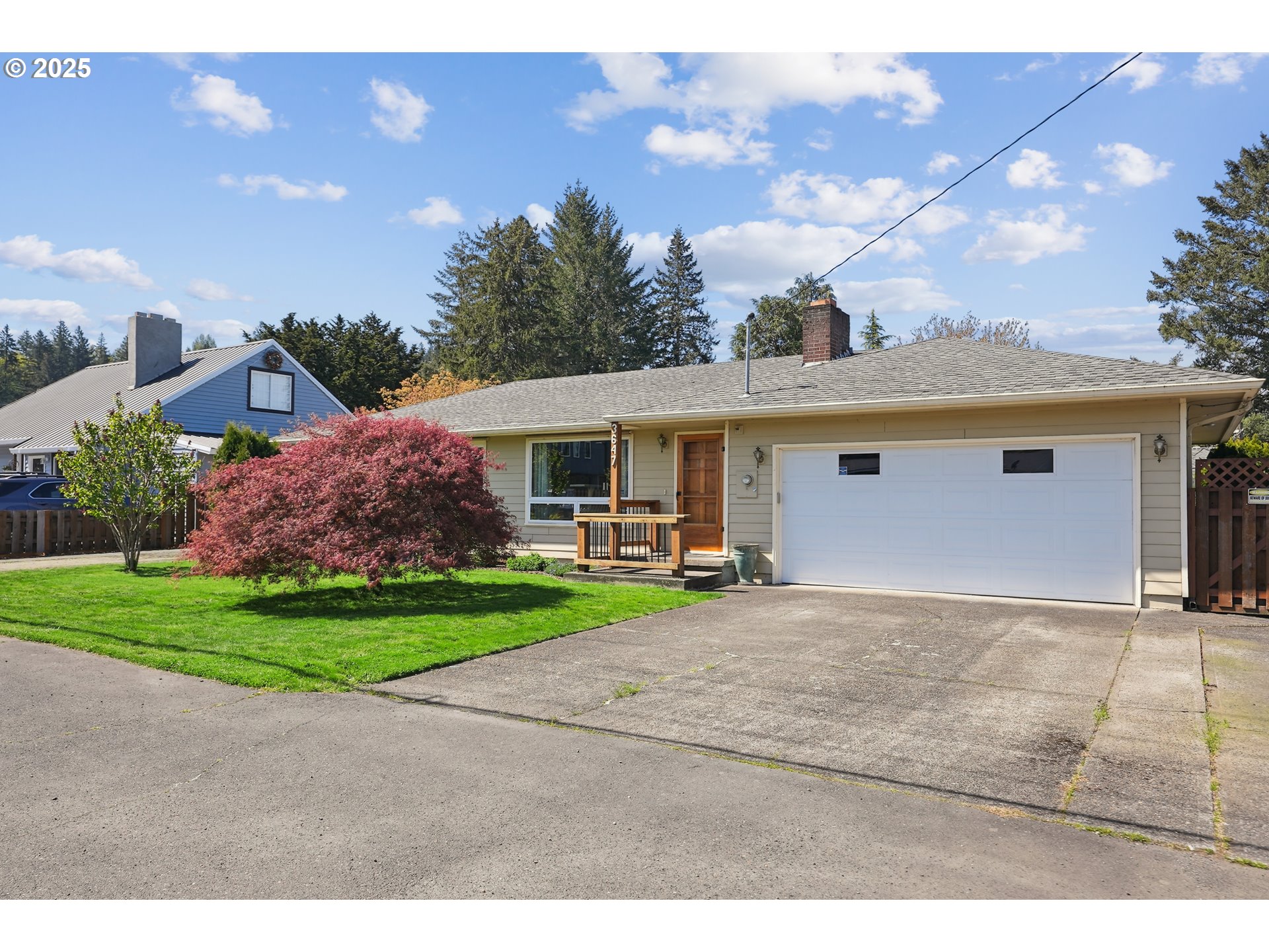 3647 Southeast 164th Avenue Portland, OR 97236 - Photo 1 of 47 a view of a house with backyard and garden