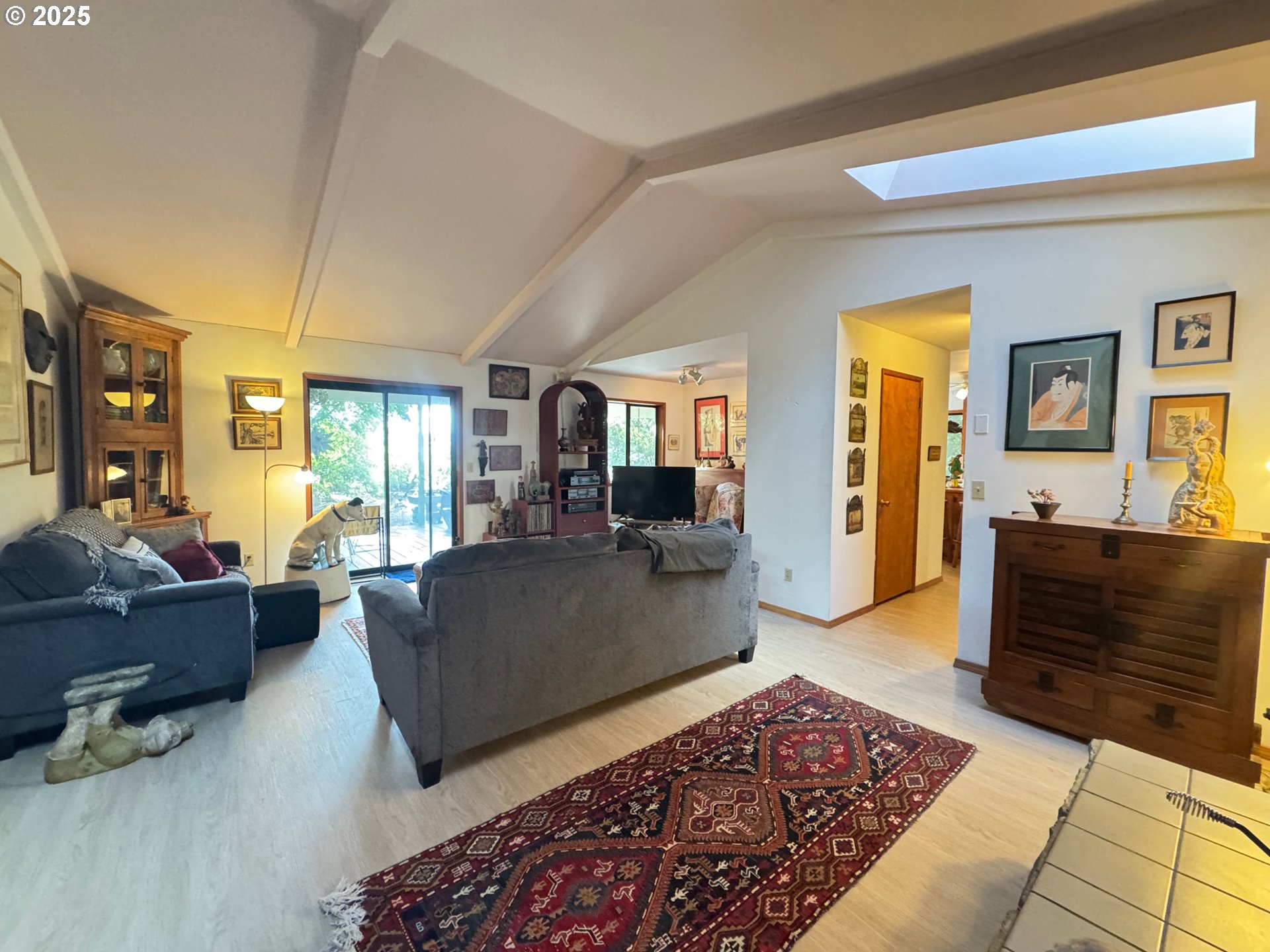 88468 Trout Pond Lane Southwest Bandon, OR 97411 - Photo 12 of 44 a living room with furniture and a dresser
