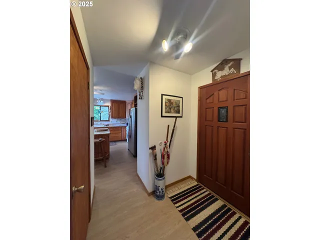 a view of a hallway with workspace