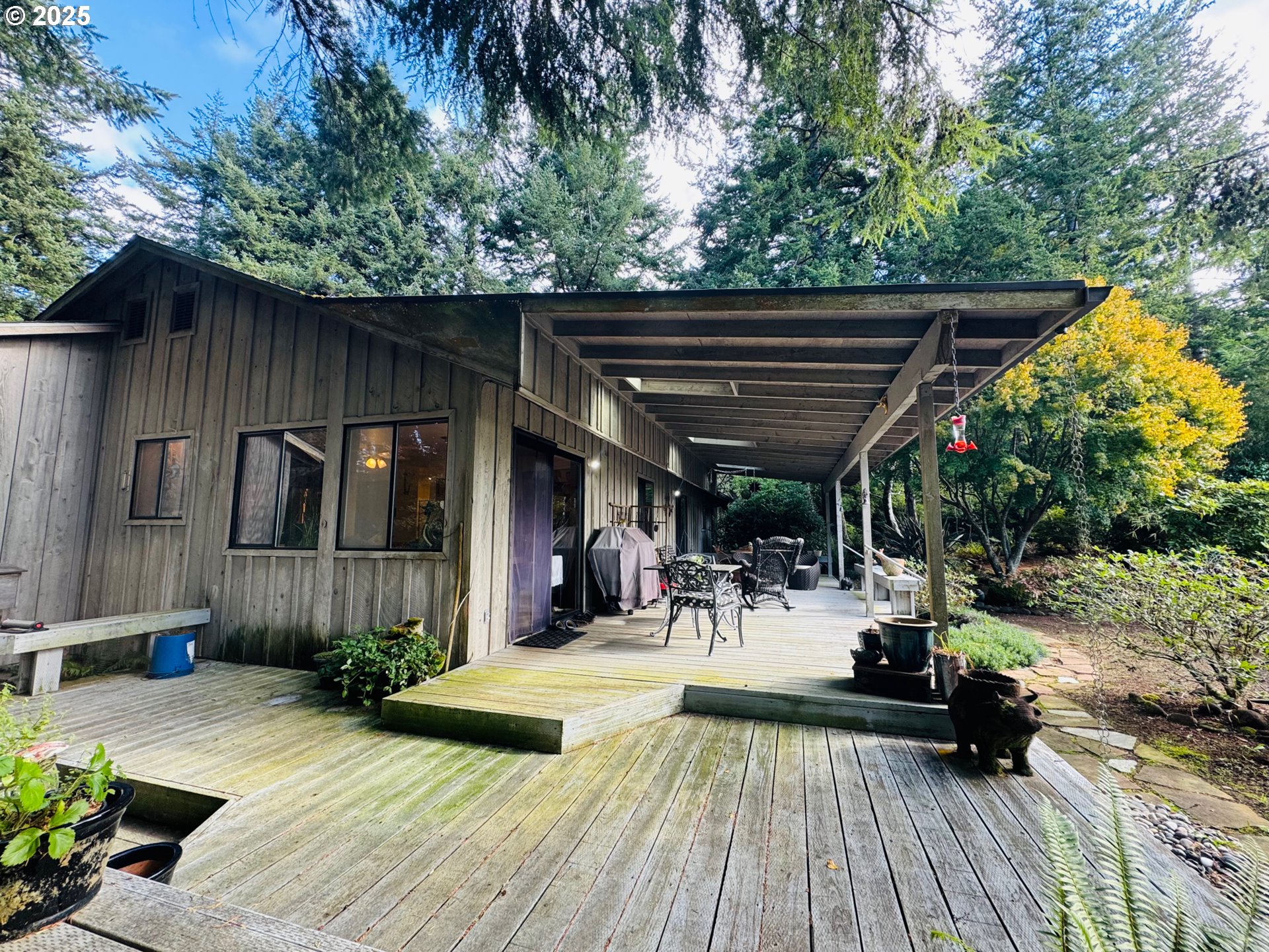 88468 Trout Pond Lane Southwest Bandon, OR 97411 - Photo 40 of 44 a view of outdoor space with seating space