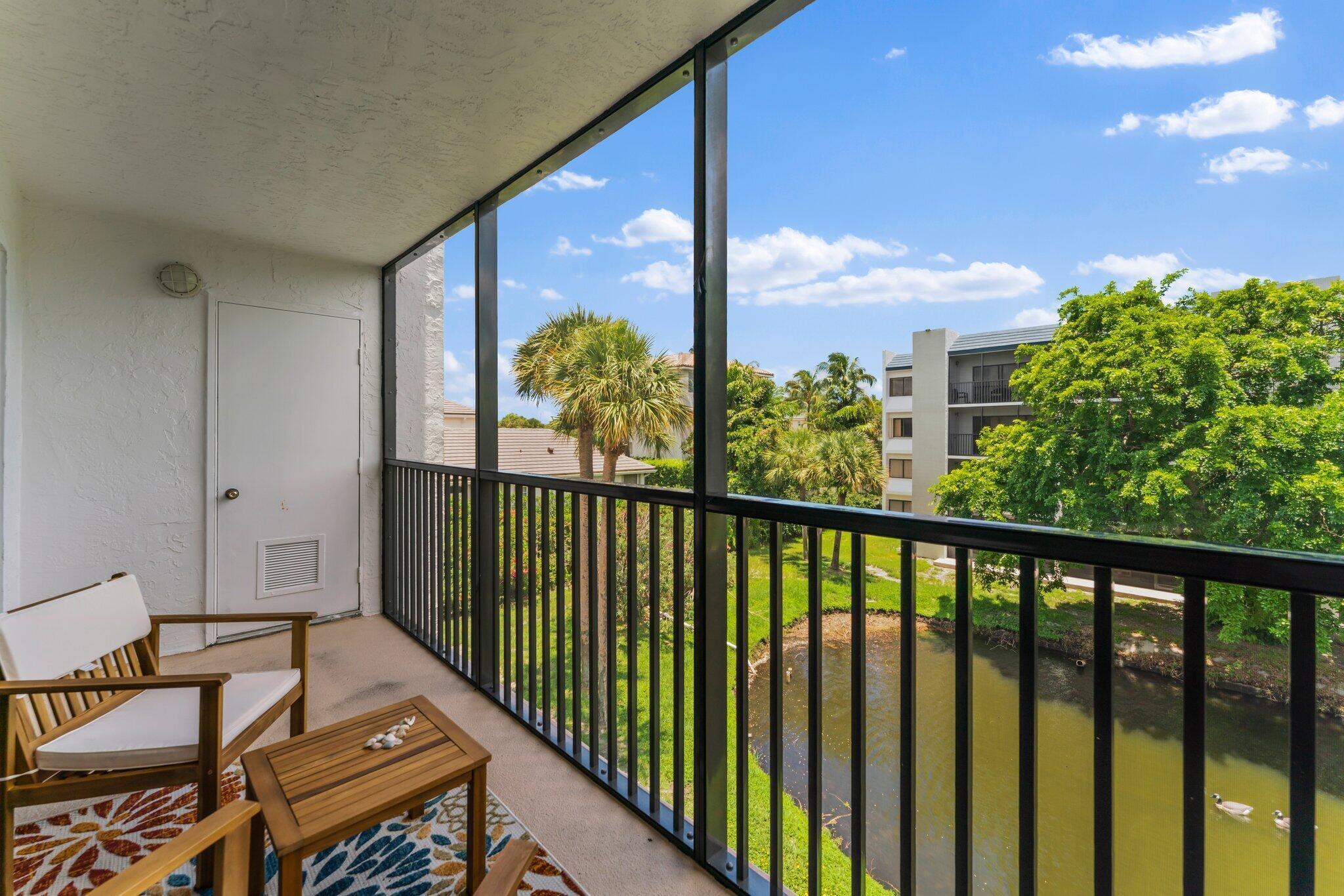 1605 Highway 1, Unit D301 Jupiter, FL 33477 - Photo 14 of 29 a view of a balcony with chairs