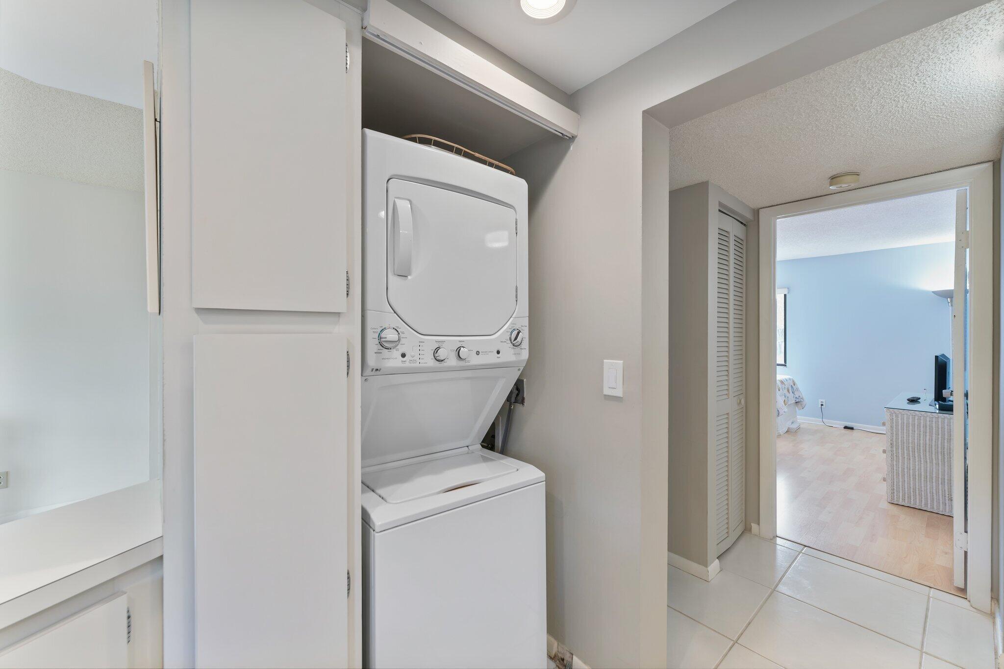 1605 Highway 1, Unit D301 Jupiter, FL 33477 - Photo 19 of 29 a bathroom with a toilet and a shower