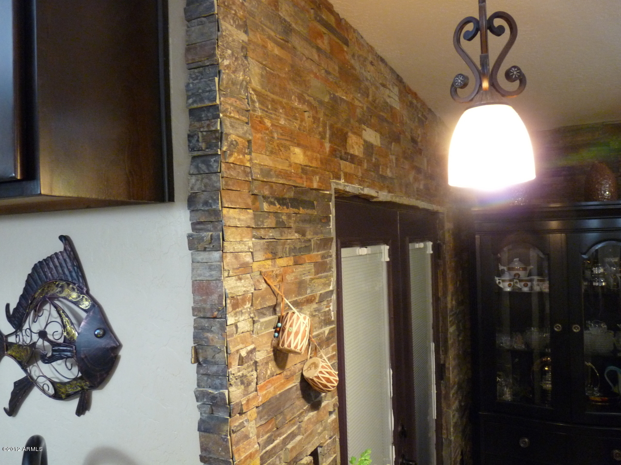 747 South Ext Road, Unit 102 Mesa, AZ 85210 - Photo 5 of 15 Ledge stone accent wall