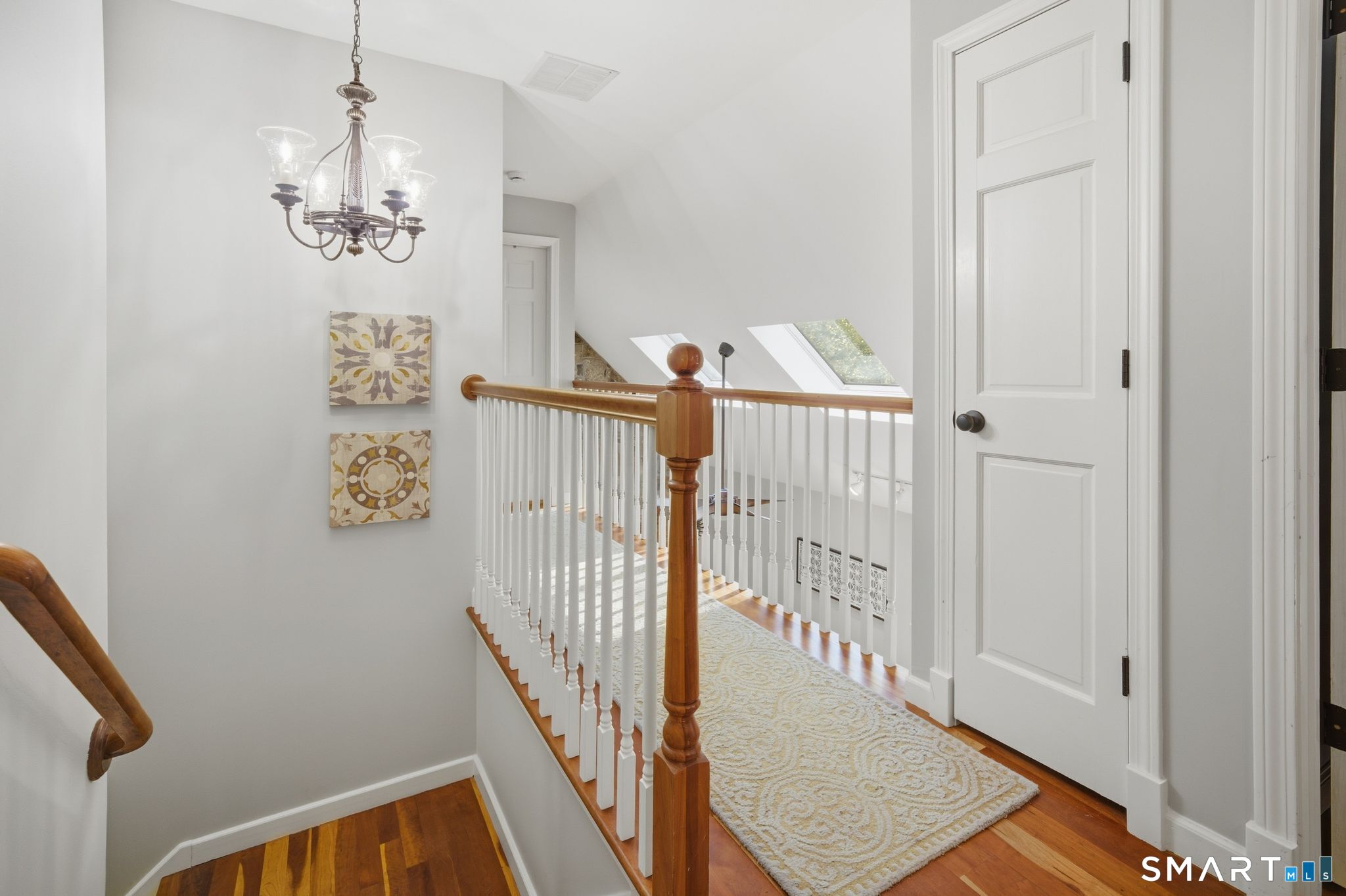 174 Walnut Hill Road Hartland, CT 06027 - Photo 20 of 36 a view of a hallway with windows