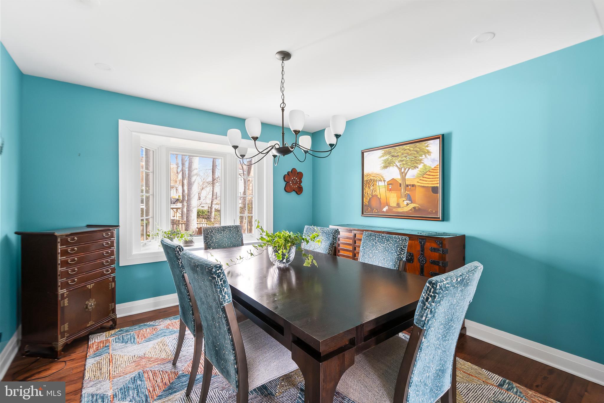 8816 Arley Drive Springfield, VA 22153 - Photo 12 of 59 a view of a dining room with furniture window and wooden floor