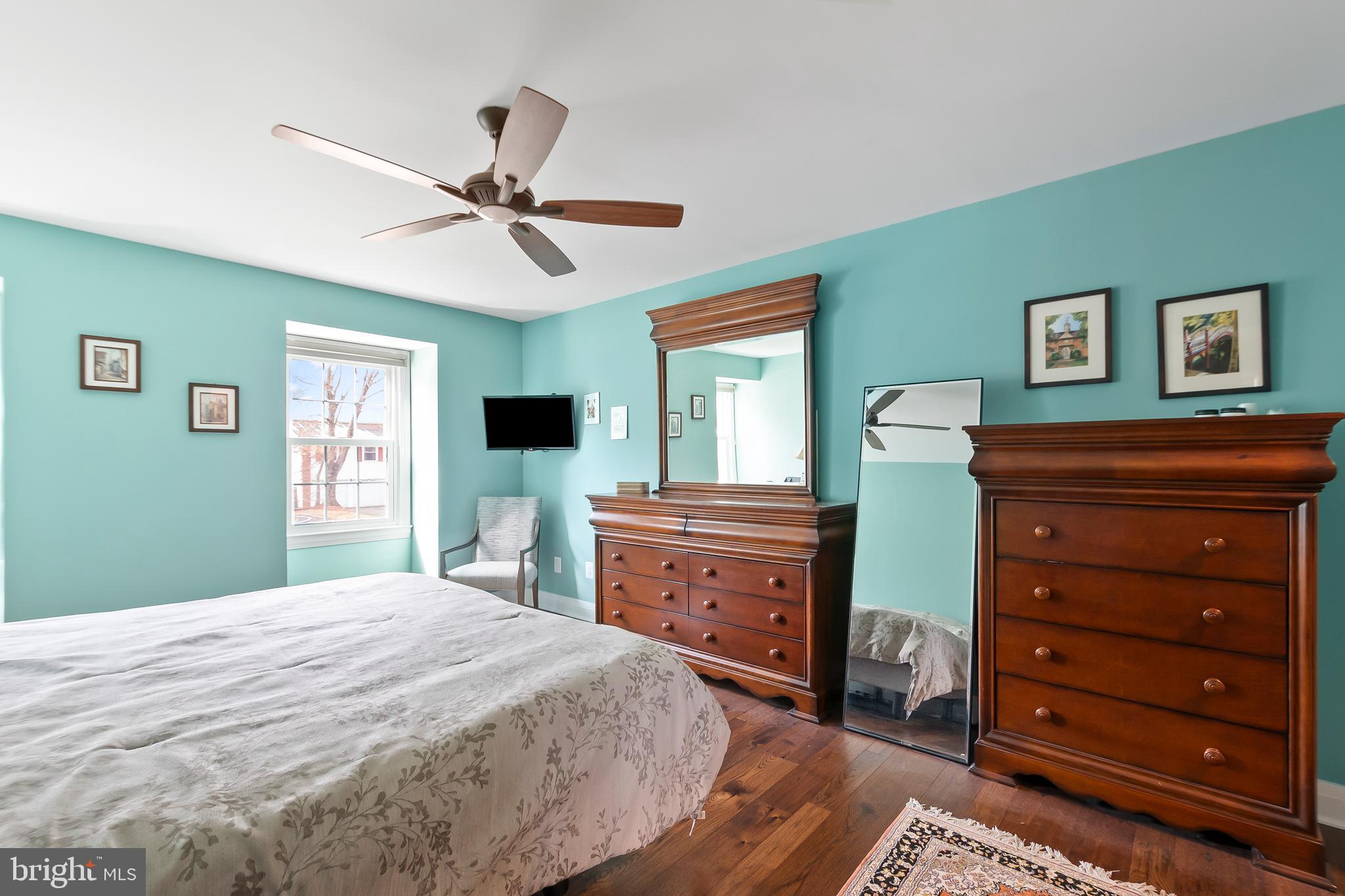 8816 Arley Drive Springfield, VA 22153 - Photo 28 of 59 a bedroom with a bed and a dresser