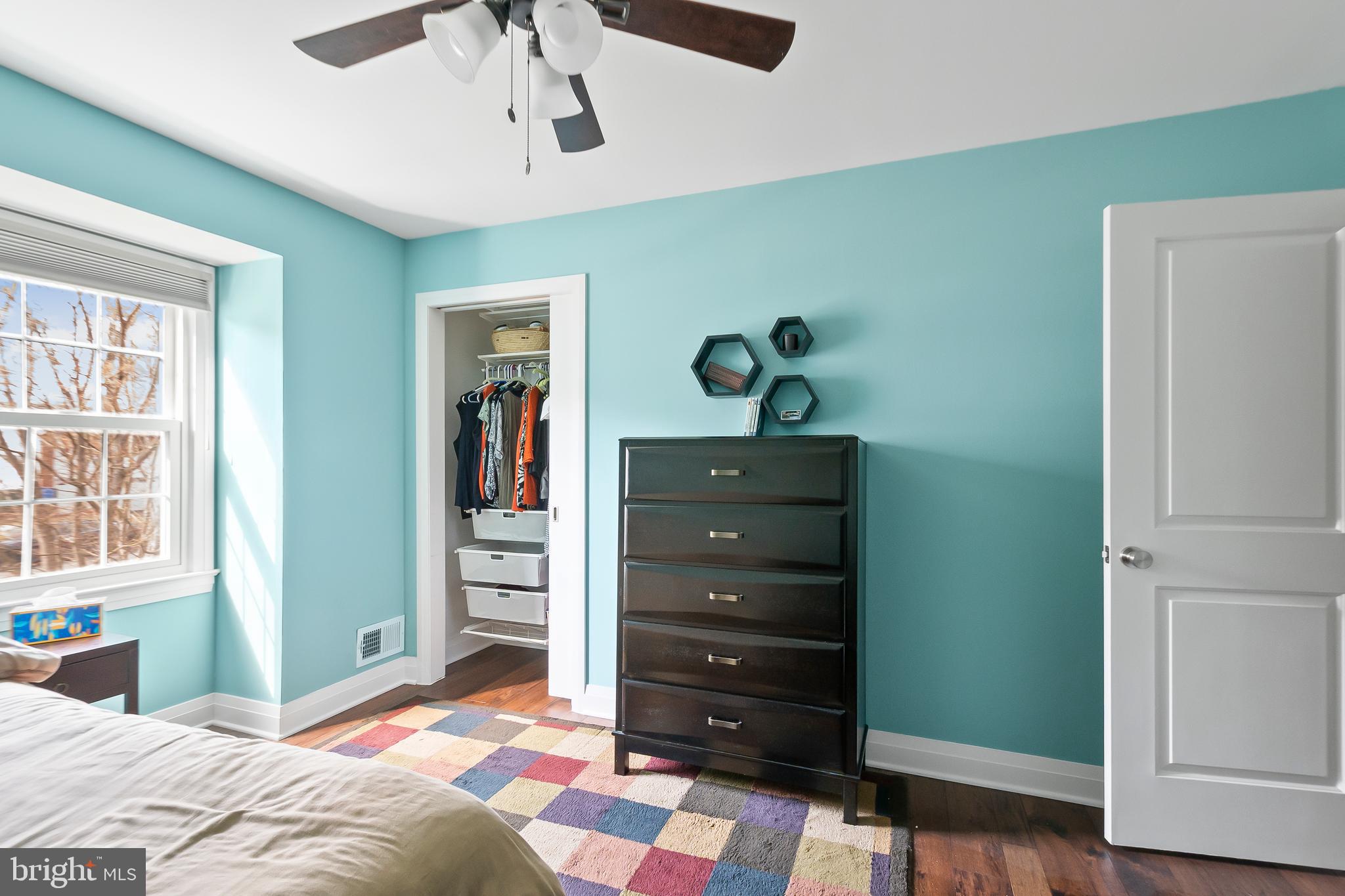 8816 Arley Drive Springfield, VA 22153 - Photo 34 of 59 a bedroom with a bed and a dresser