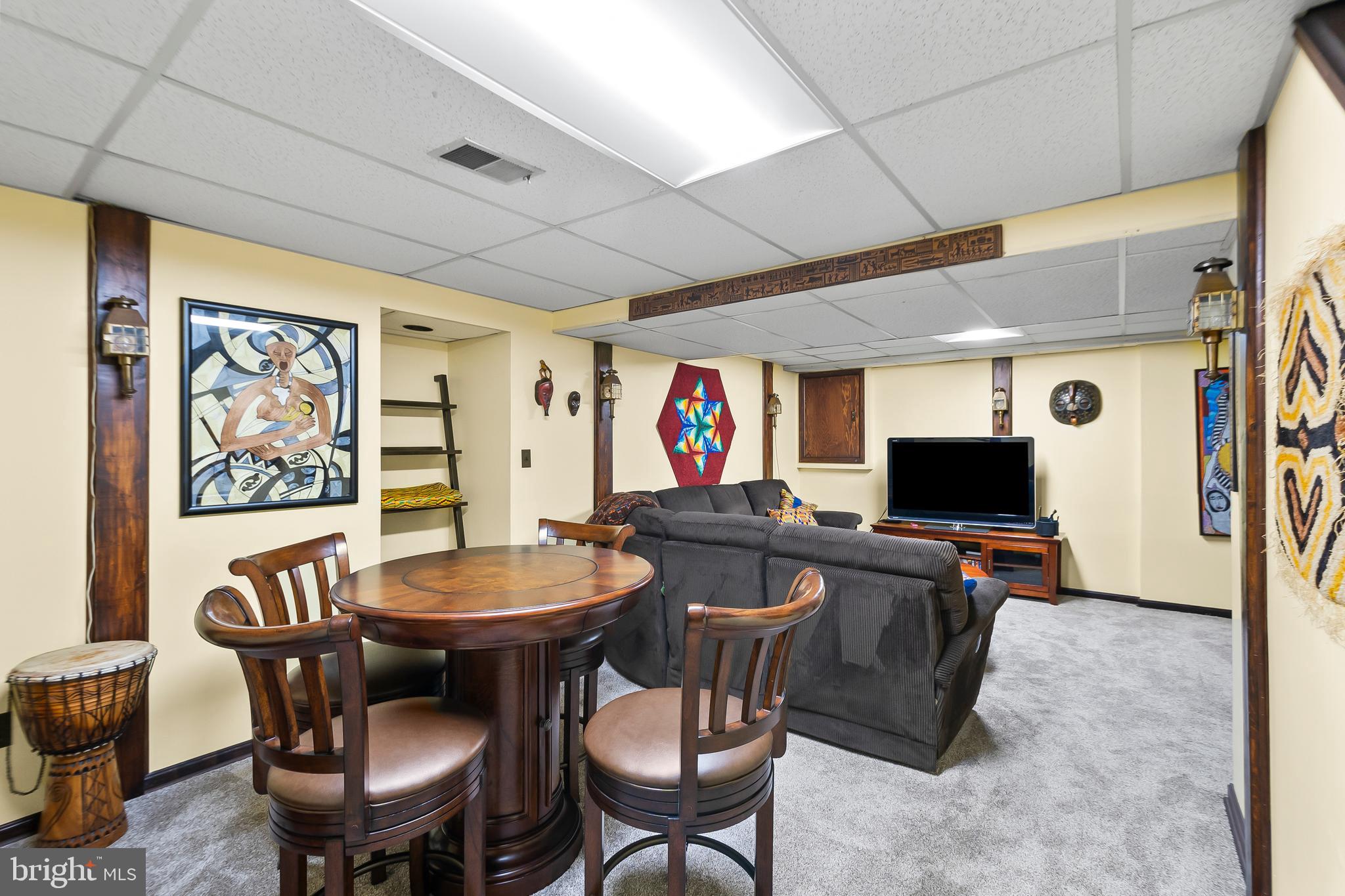 8816 Arley Drive Springfield, VA 22153 - Photo 41 of 59 a view of a livingroom with furniture and a flat screen tv