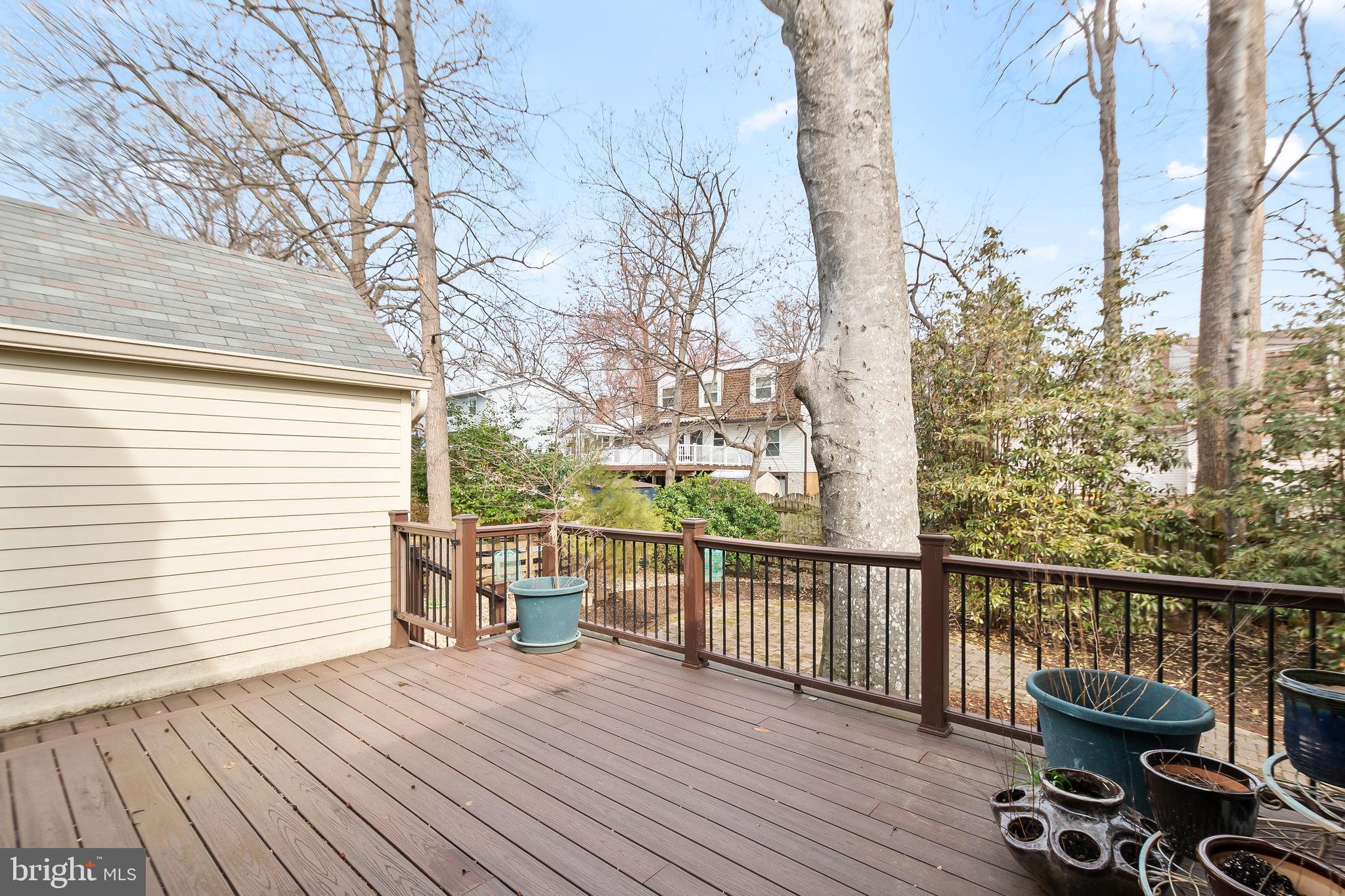 8816 Arley Drive Springfield, VA 22153 - Photo 49 of 59 a view of a balcony with wooden floor and fence