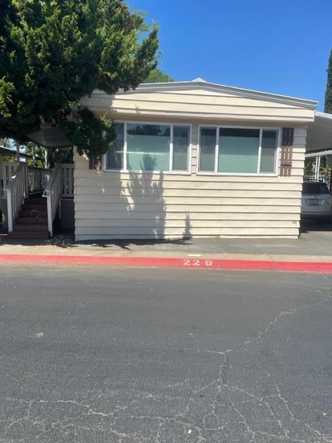 a front view of a house with garage