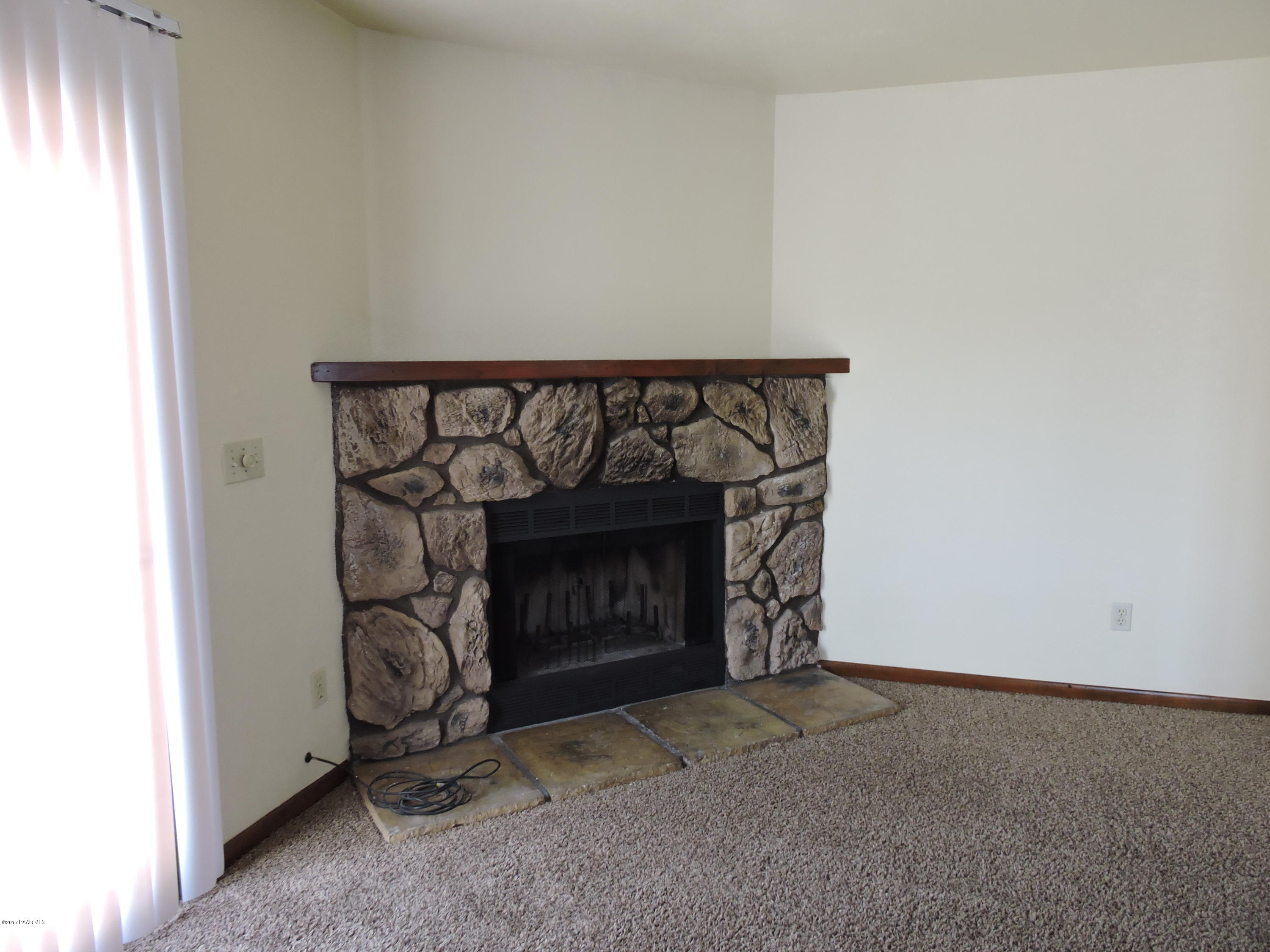 1230 Stetson Road, Unit 12 Prescott, AZ 86303 - Photo 6 of 39 Stone Fireplace
