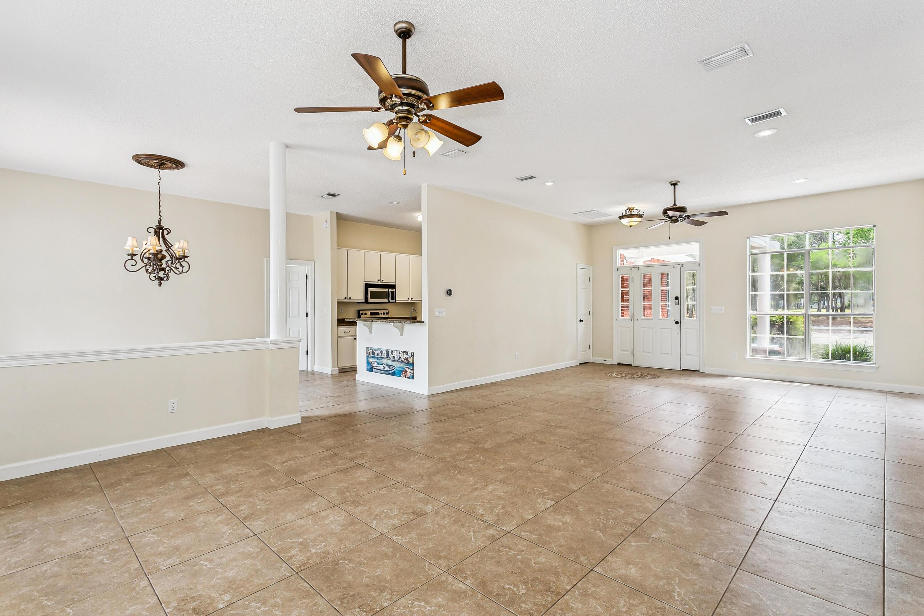 311 Juniper Street Destin, FL 32541 - Photo 11 of 35 Column Separates Lving/Dining