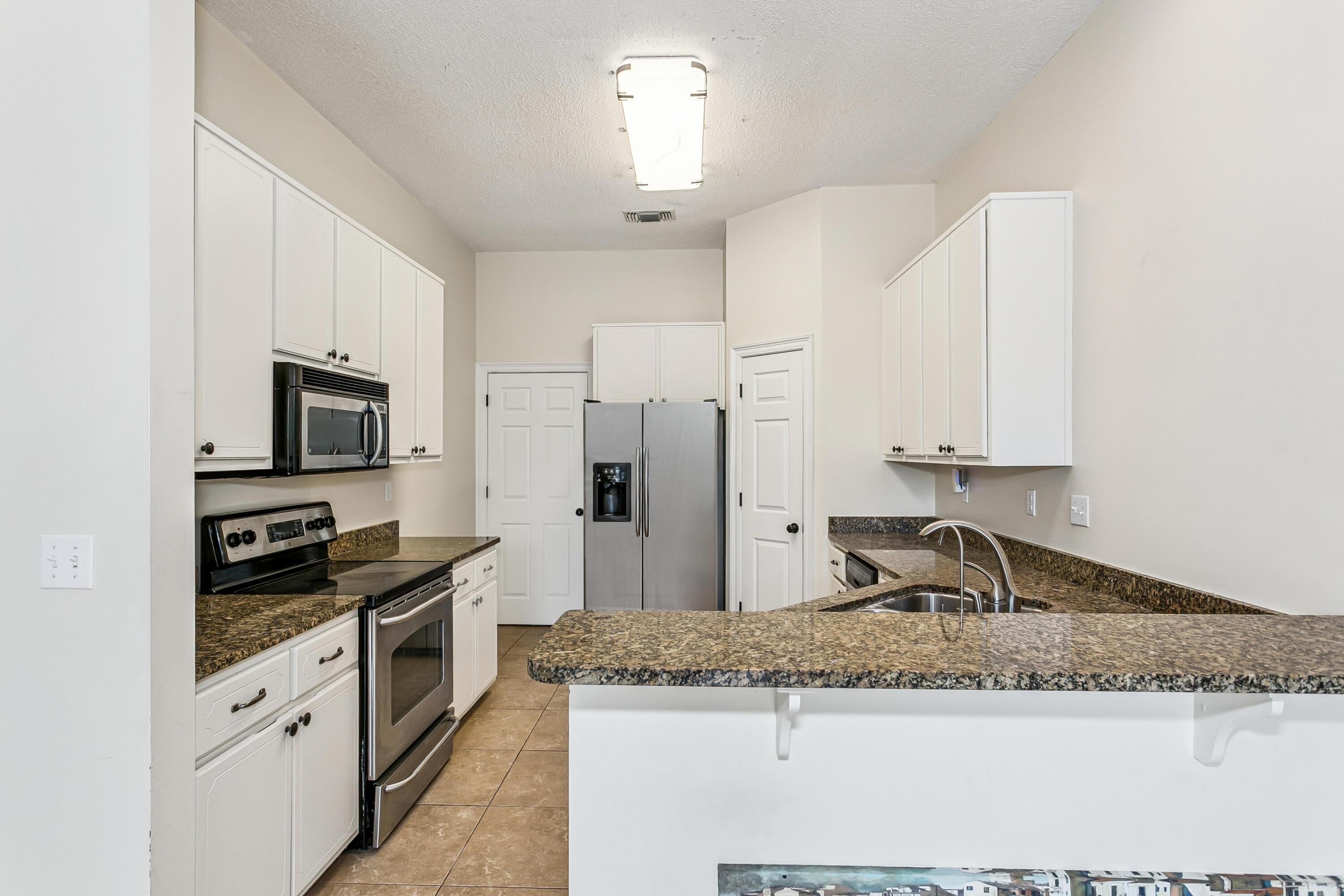 311 Juniper Street Destin, FL 32541 - Photo 15 of 35 Kitchen Equals UNTAPPED EQUITY