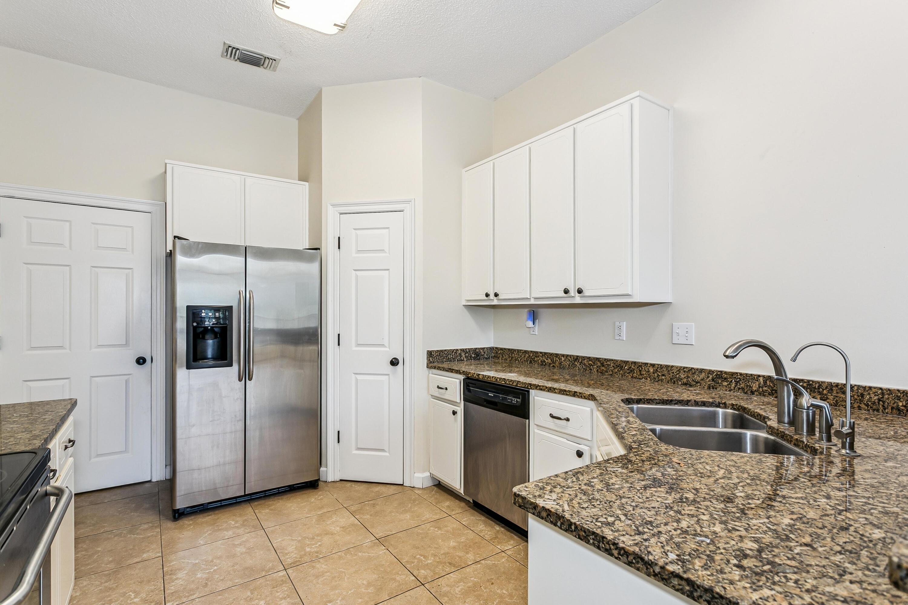 311 Juniper Street Destin, FL 32541 - Photo 17 of 35 Door Leads to Laundry