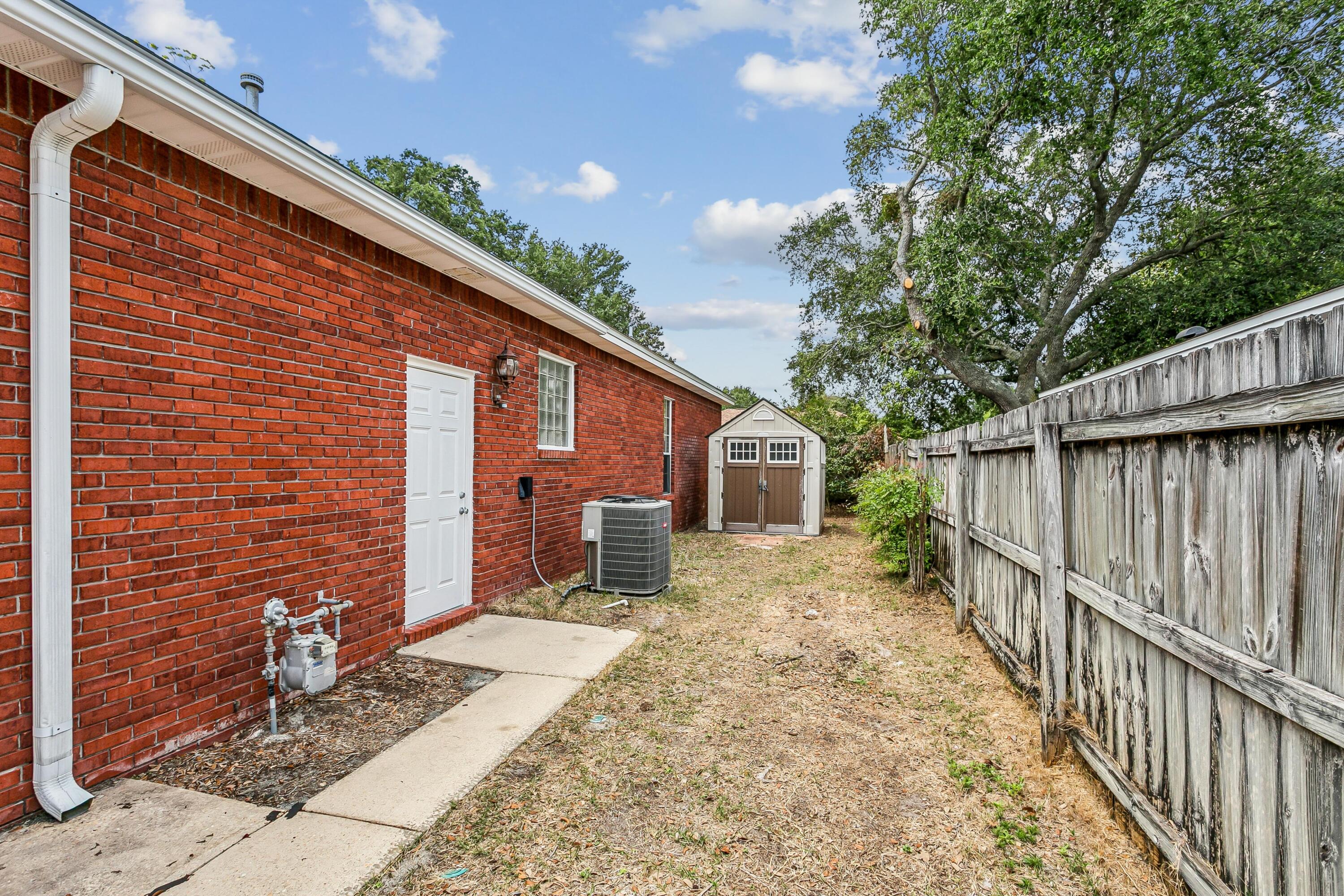 311 Juniper Street Destin, FL 32541 - Photo 33 of 35 Suncoast Ventilated Storage Shed!