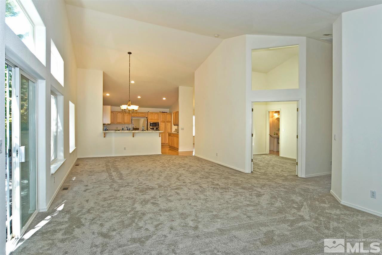 6030 Sunrise Meadows Loop Reno, NV 89519 - Photo 15 of 22 a view of a hallway with a bathroom