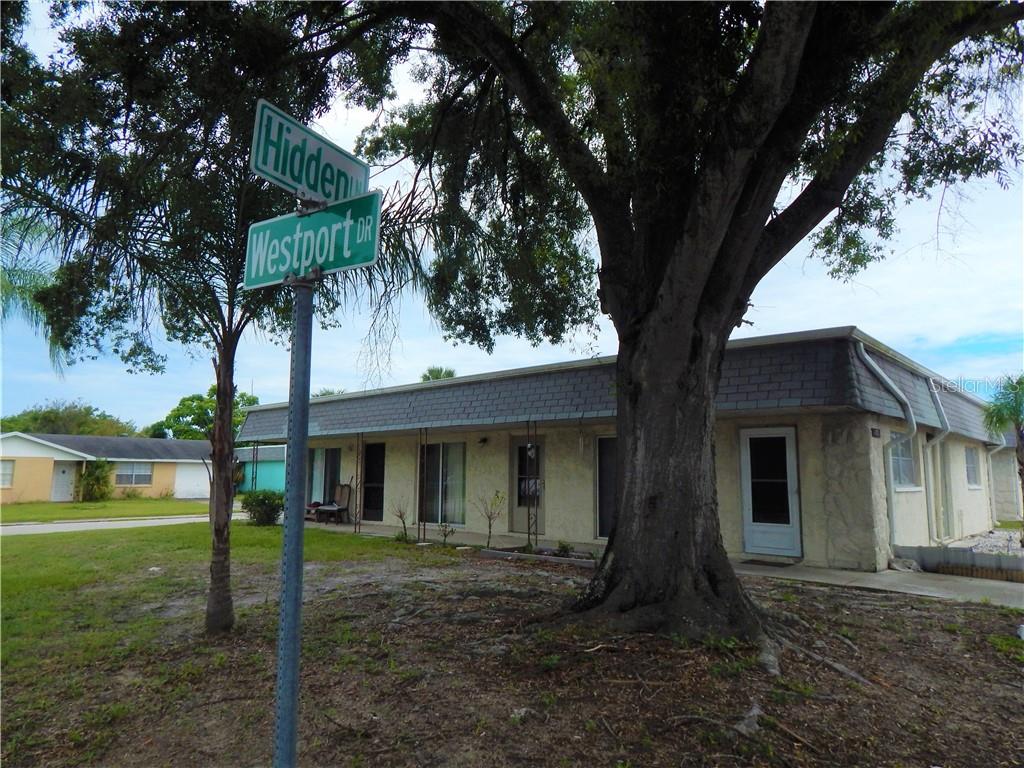 9800 Hidden Lane, Unit 2 Port Richey, FL 34668 - Photo 1 of 1 Front entrance of the community