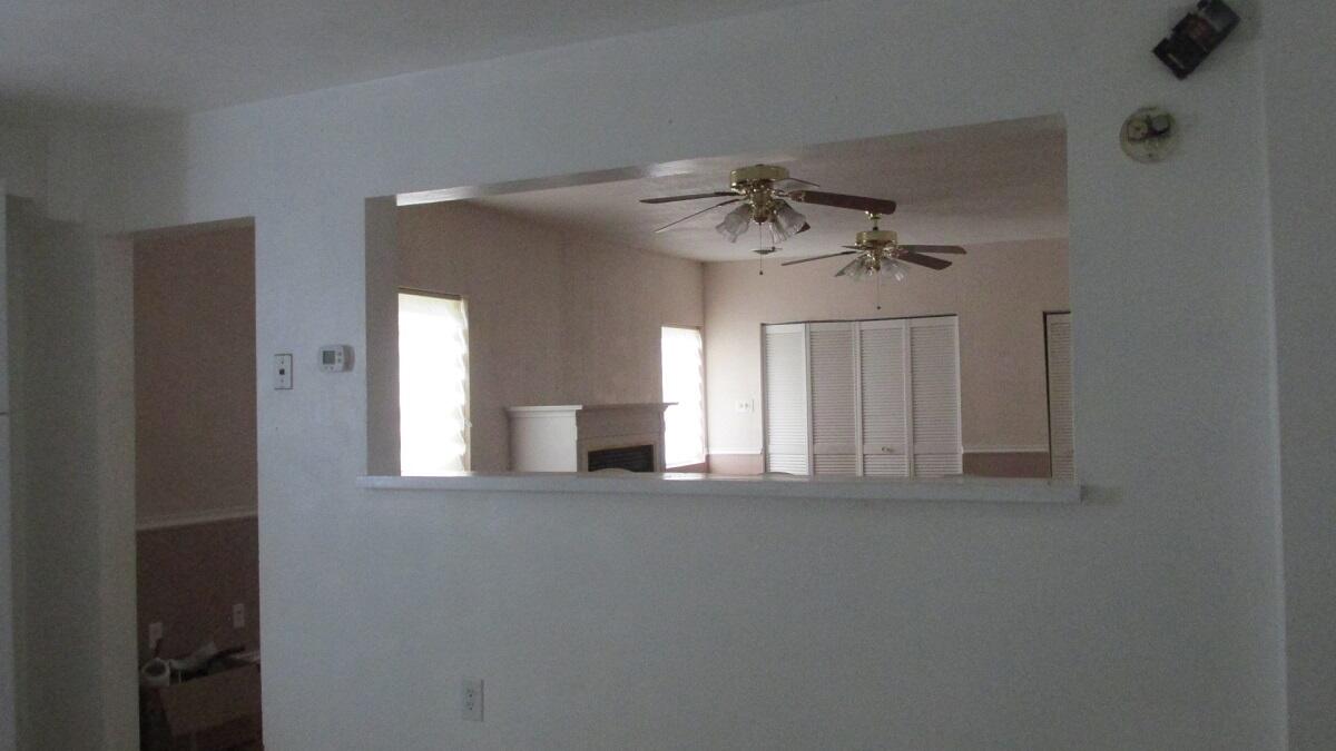 2400 Rutrough Road Southeast Roanoke, VA 24014 - Photo 13 of 21 a view of a livingroom with a ceiling fan and window