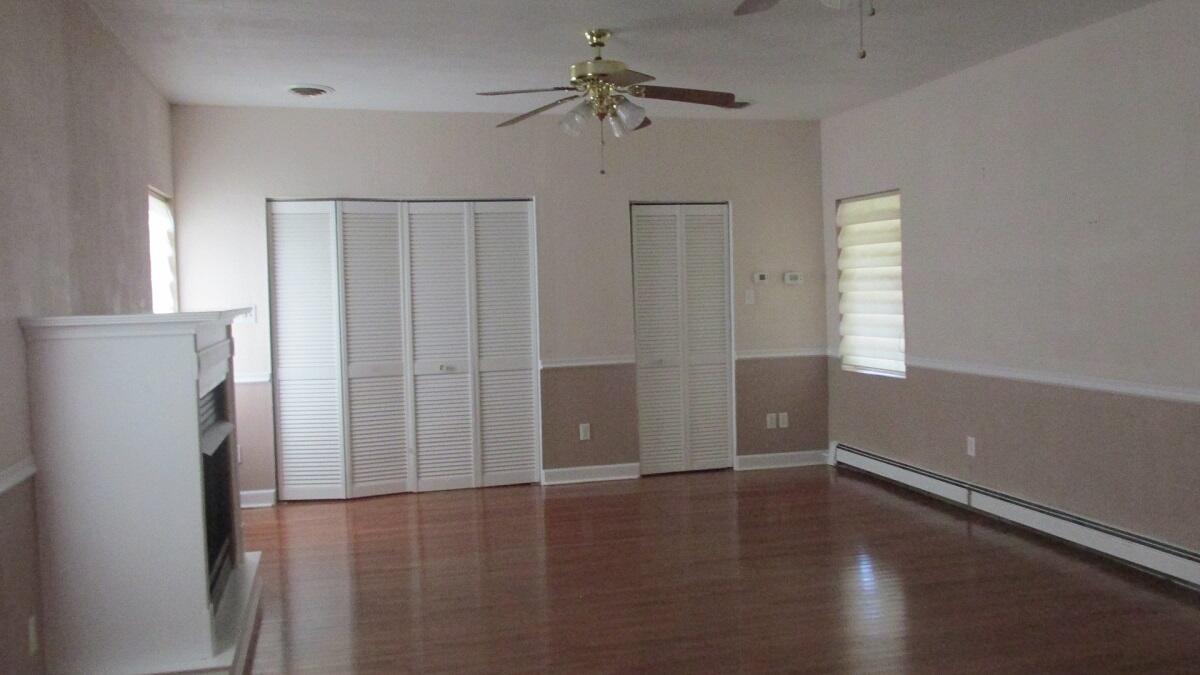 2400 Rutrough Road Southeast Roanoke, VA 24014 - Photo 14 of 21 wooden floor in an empty room with a window