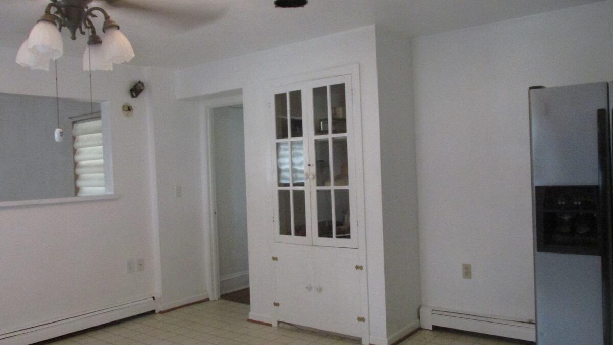 2400 Rutrough Road Southeast Roanoke, VA 24014 - Photo 17 of 21 a view of cabinet and mirror