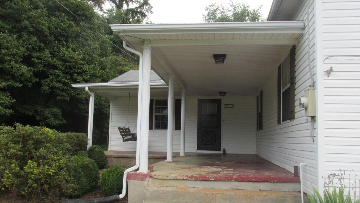 2400 Rutrough Road Southeast Roanoke, VA 24014 - Photo 21 of 21 a view of house with tree in front of it