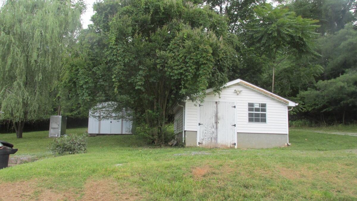 2400 Rutrough Road Southeast Roanoke, VA 24014 - Photo 4 of 21 a view of a house with a yard
