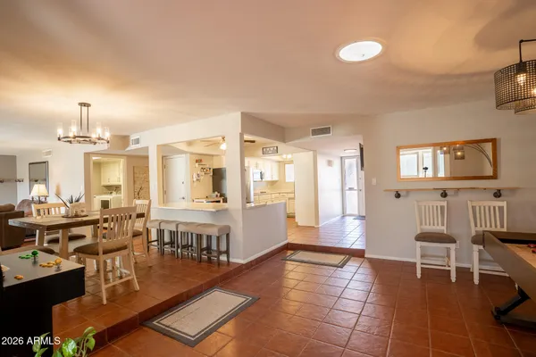 a view of a living room and dining room