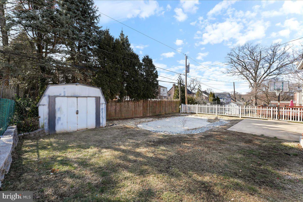 1449 Burmont Road Drexel Hill, PA 19026 - Photo 25 of 27 a view of a yard with a large tree