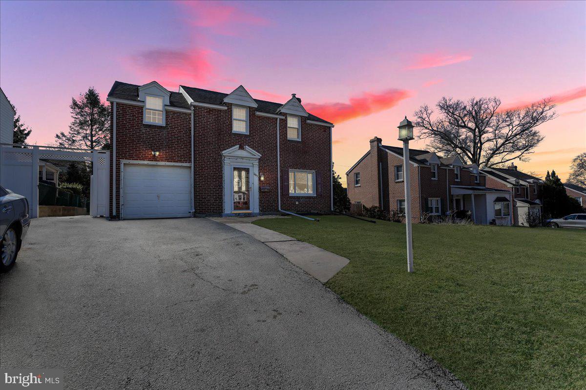 1449 Burmont Road Drexel Hill, PA 19026 - Photo 27 of 27 a large building with a yard