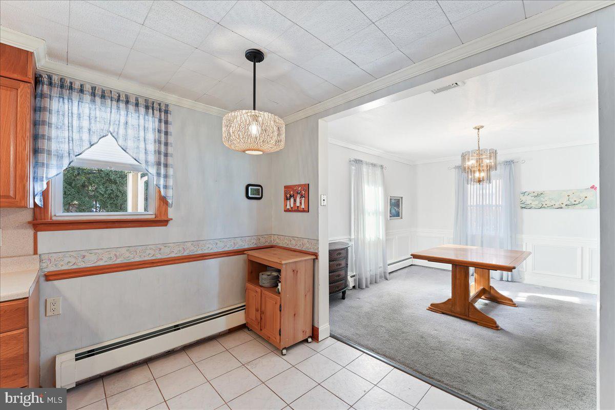 1449 Burmont Road Drexel Hill, PA 19026 - Photo 6 of 27 a view of an entryway with chandelier