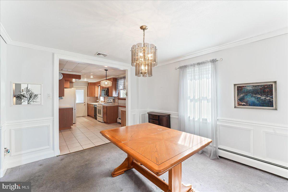 1449 Burmont Road Drexel Hill, PA 19026 - Photo 10 of 27 a room with pool table and windows