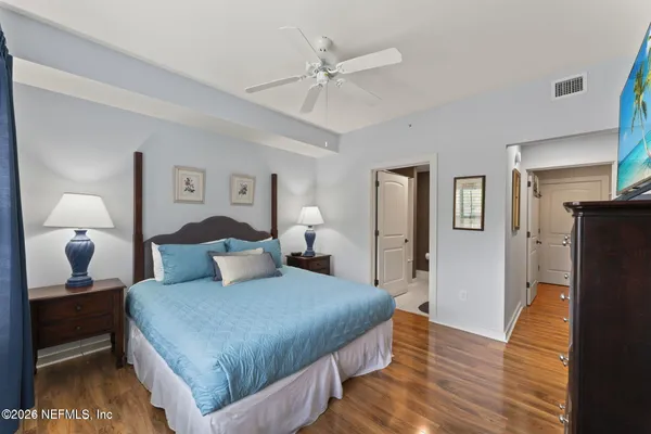 a bathroom with a shower and a bath tub
