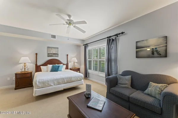 a bathroom with a shower and a tub