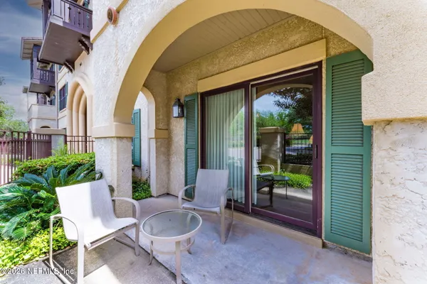 an aerial view of residential house with outdoor space and swimming pool
