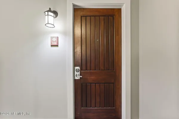 a view of a living room and bathroom