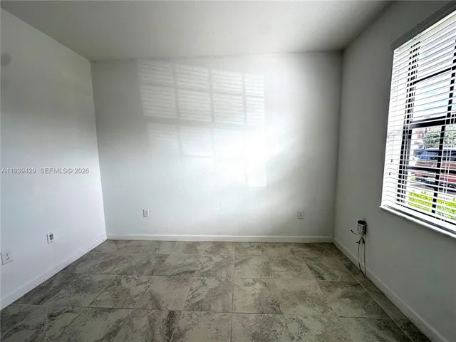 an empty room with a window