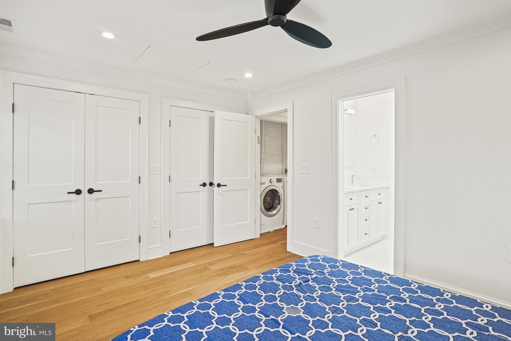1920 35th Street Northwest Washington, DC 20007 - Photo 20 of 53 a bedroom with a bed and a walk in closet