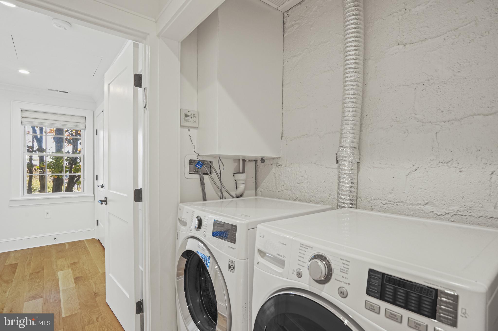 1920 35th Street Northwest Washington, DC 20007 - Photo 30 of 53 a utility room with dryer and washer