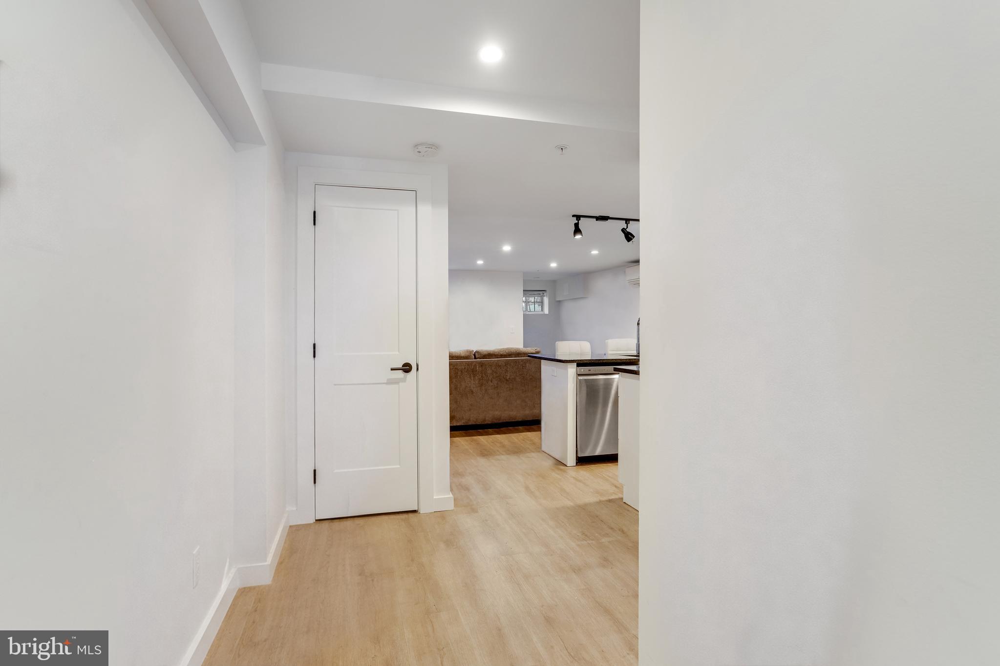 1920 35th Street Northwest Washington, DC 20007 - Photo 40 of 53 a view of a kitchen with a sink and cabinets