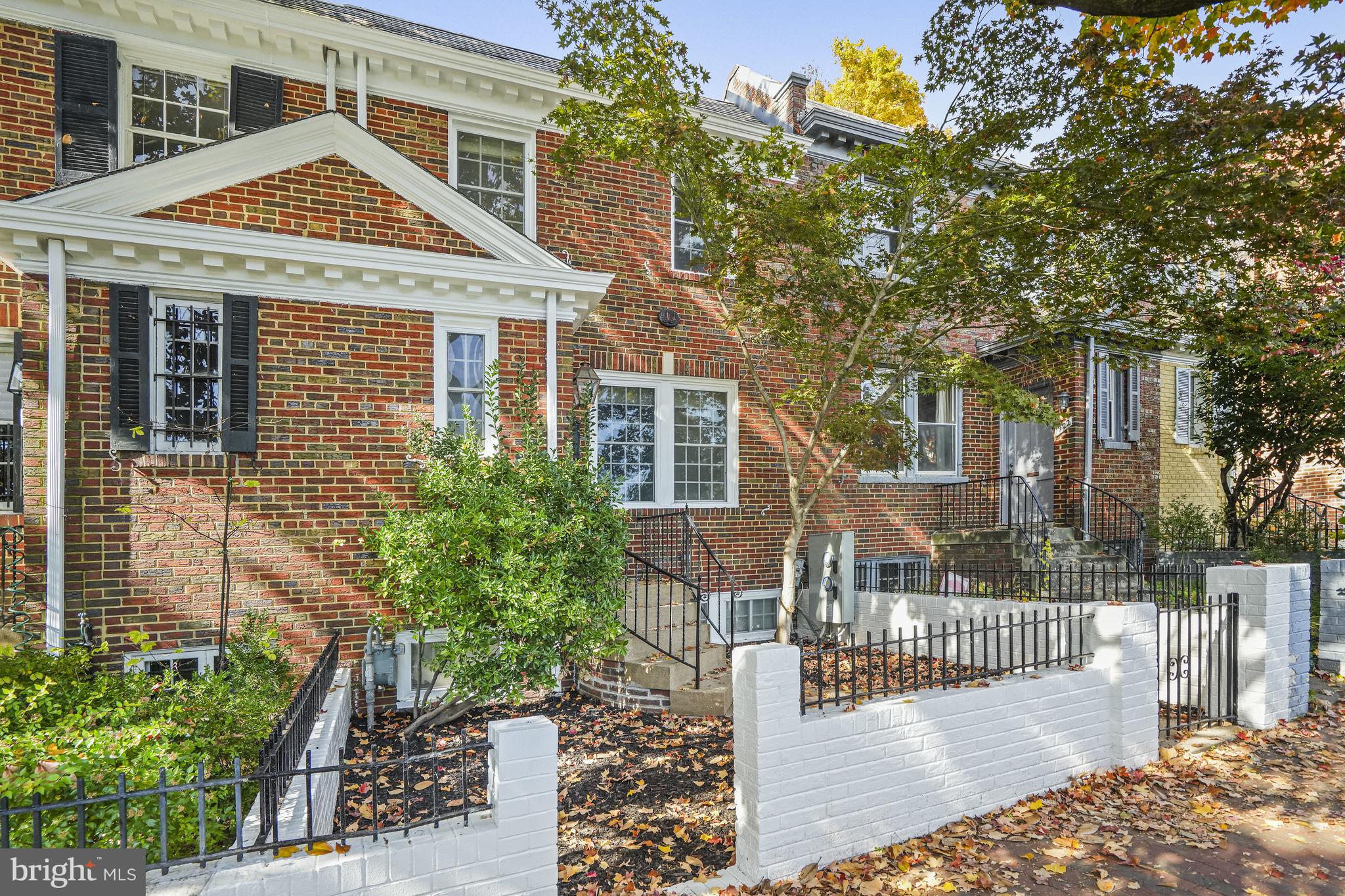 1920 35th Street Northwest Washington, DC 20007 - Photo 49 of 53 a front view of a house with a yard